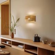 Euluna vägglampa Tornado, guldfärgad