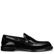 Dolce & Gabbana Svarta platta skor i läder med logomönstrad sula Black...