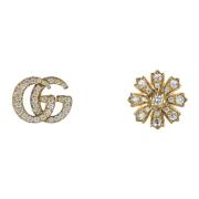 Gucci Flora örhängen med Double G-detalj i gult guld och diamanter Yel...