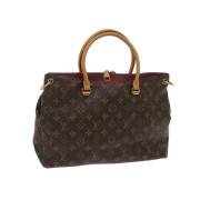 Louis Vuitton Vintage Pre-owned Belagd canvas handvskor Brown, Dam