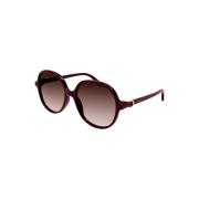 Cartier Stiliga solglasögon med Indeterminado Montura Brown, Dam