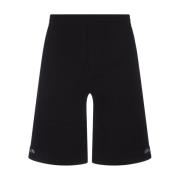 Alexander McQueen Svarta Bermuda Shorts med Kontrasterande Insatser Bl...