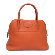 Hermès Vintage Pre-owned Laeder handvskor Orange, Dam