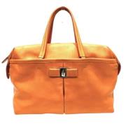 Salvatore Ferragamo Pre-owned Pre-owned Tyg handvskor Orange, Dam