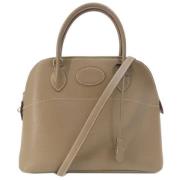 Hermès Vintage Pre-owned Tyg handvskor Beige, Dam