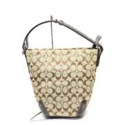 Coach Pre-owned Pre-owned Tyg axelremsvskor Beige, Dam