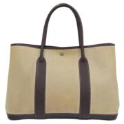 Hermès Vintage Pre-owned Tyg handvskor Beige, Dam