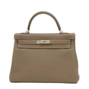 Hermès Vintage Pre-owned Tyg handvskor Beige, Dam