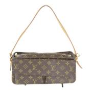 Louis Vuitton Vintage Pre-owned Canvas axelremsvskor Brown, Dam