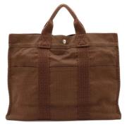 Hermès Vintage Pre-owned Canvas handvskor Brown, Dam