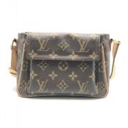 Louis Vuitton Vintage Pre-owned Canvas axelremsvskor Brown, Dam