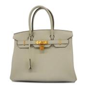 Hermès Vintage Pre-owned Canvas handvskor Beige, Dam