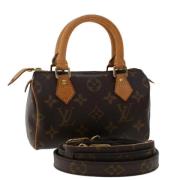 Louis Vuitton Vintage Pre-owned Canvas handvskor Brown, Dam