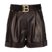 Balmain Kort hög midja i läder med spänne Black, Dam