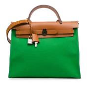 Hermès Vintage Pre-owned Canvas handvskor Green, Dam