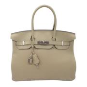 Hermès Vintage Pre-owned Laeder handvskor Beige, Dam