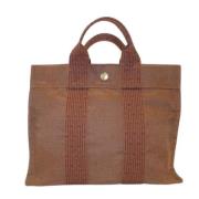 Hermès Vintage Pre-owned Canvas handvskor Brown, Dam