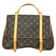 Louis Vuitton Vintage Pre-owned Tyg axelremsvskor Brown, Dam