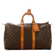 Louis Vuitton Vintage Pre-owned Belagd canvas handvskor Brown, Dam