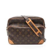 Louis Vuitton Vintage Pre-owned Canvas axelremsvskor Brown, Dam