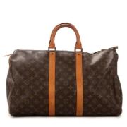 Louis Vuitton Vintage Pre-owned Belagd canvas handvskor Brown, Dam