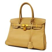 Hermès Vintage Pre-owned Laeder handvskor Beige, Dam