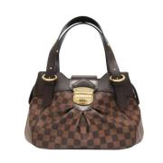 Louis Vuitton Vintage Pre-owned Canvas axelremsvskor Brown, Dam