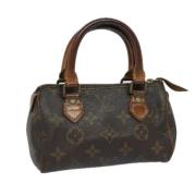 Louis Vuitton Vintage Pre-owned Canvas handvskor Brown, Dam