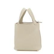 Hermès Vintage Pre-owned Laeder handvskor Beige, Dam