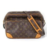 Louis Vuitton Vintage Pre-owned Canvas axelremsvskor Brown, Dam