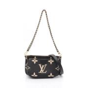 Louis Vuitton Vintage Pre-owned Laeder kuvertvskor Beige, Dam