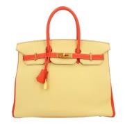 Hermès Vintage Pre-owned Laeder handvskor Yellow, Dam