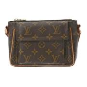 Louis Vuitton Vintage Pre-owned Canvas axelremsvskor Brown, Dam