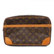 Louis Vuitton Vintage Pre-owned Tyg kuvertvskor Brown, Dam