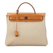 Hermès Vintage Pre-owned Canvas handvskor Beige, Dam