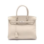 Hermès Vintage Pre-owned Laeder handvskor Beige, Dam