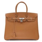 Hermès Vintage Pre-owned Laeder handvskor Yellow, Dam