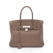 Hermès Vintage Pre-owned Laeder handvskor Beige, Dam