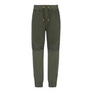 Balmain Löst sittande denim- och jerseyjeans Green, Herr