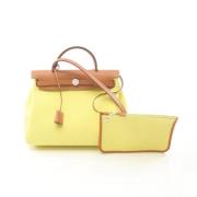 Hermès Vintage Pre-owned Canvas handvskor Yellow, Dam