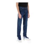 Off White Mörk tvättade vanliga jeans med avsmalnande passform Blue, H...