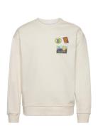 Loose Fit Crew Sweat With Badge Emb Cream Knowledge Cotton Apparel