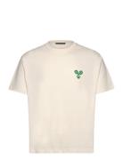 Tjorn Boxy Printed T-Shirt Designers T-shirts Short-sleeved Cream J. L...