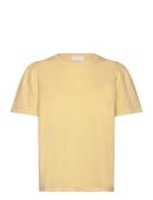 Lr-Isol Tops T-shirts & Tops Short-sleeved Yellow Levete Room