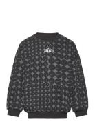 Nike Nkg Essentials Aop Ft Crew Svart